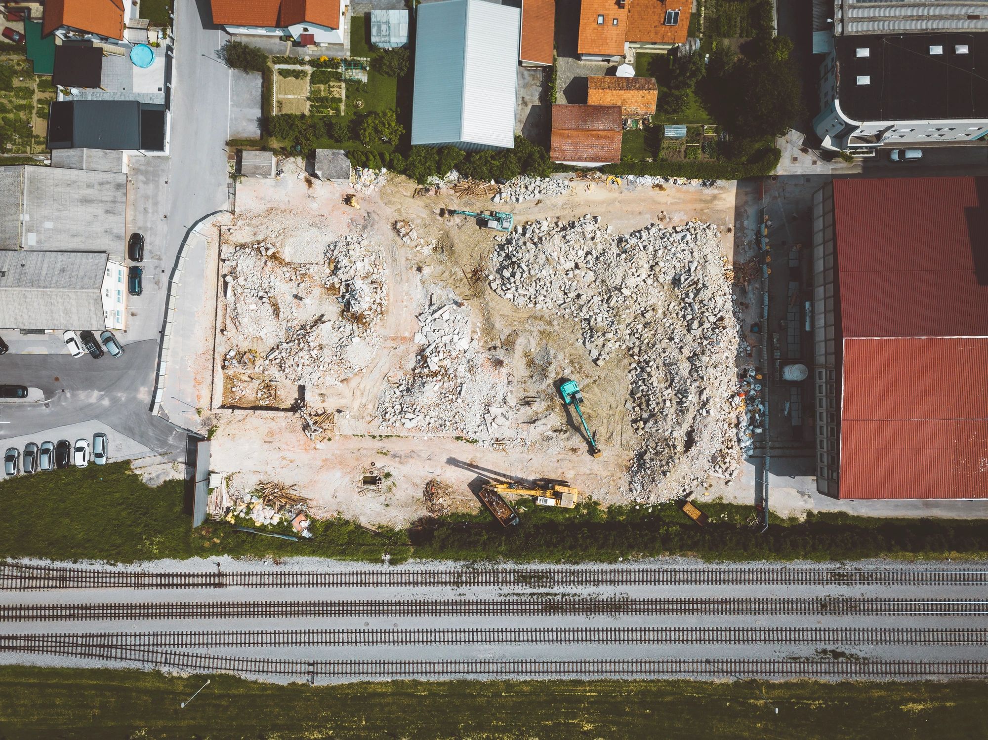 Aerial view of active grading work at a construction site